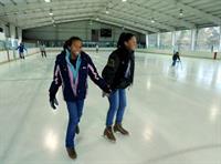 Image of people figure skating at Buhr